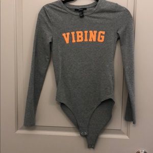 Long sleeve snap body suit